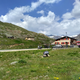 Bikes, a photographing ass and, yes, an Alfa Romeo Stelvio. At (almost) Stelvio. It had Belgian plates.